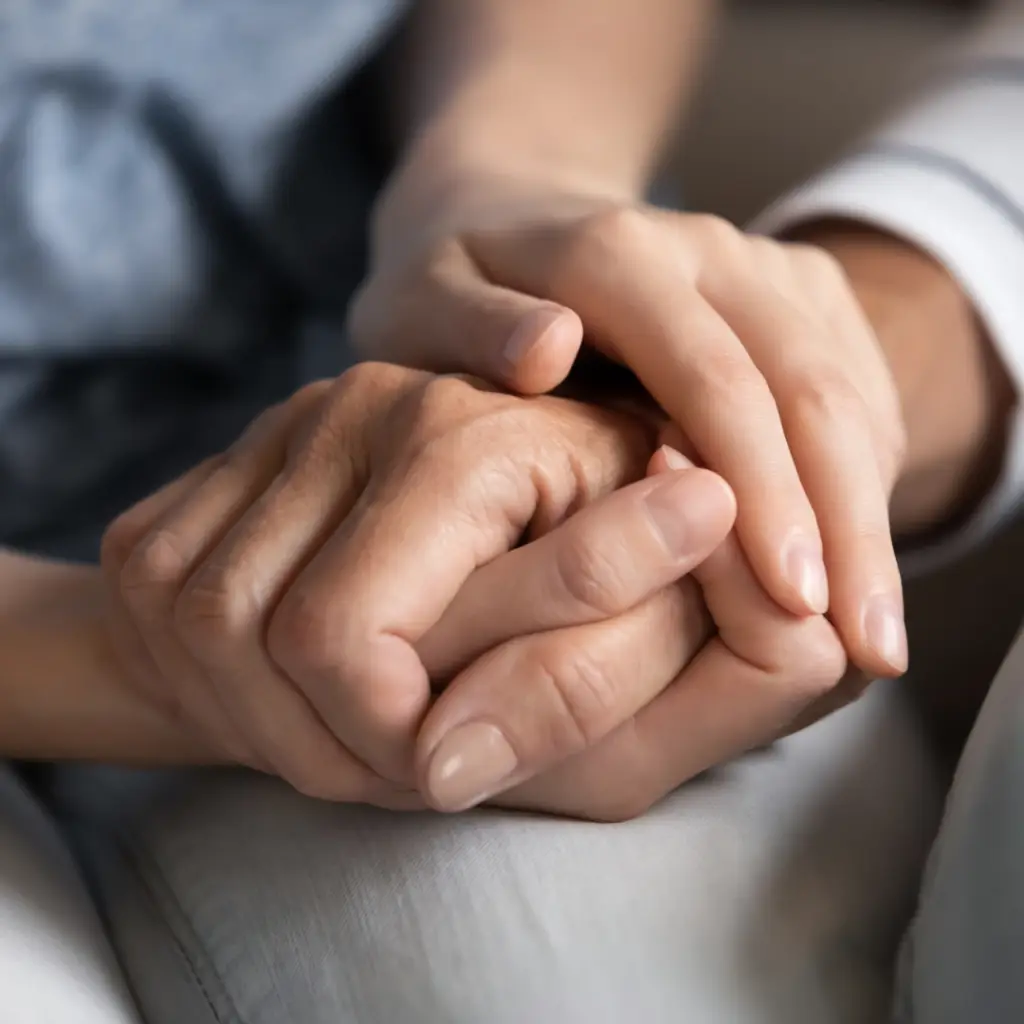 a closeup of people holding hands