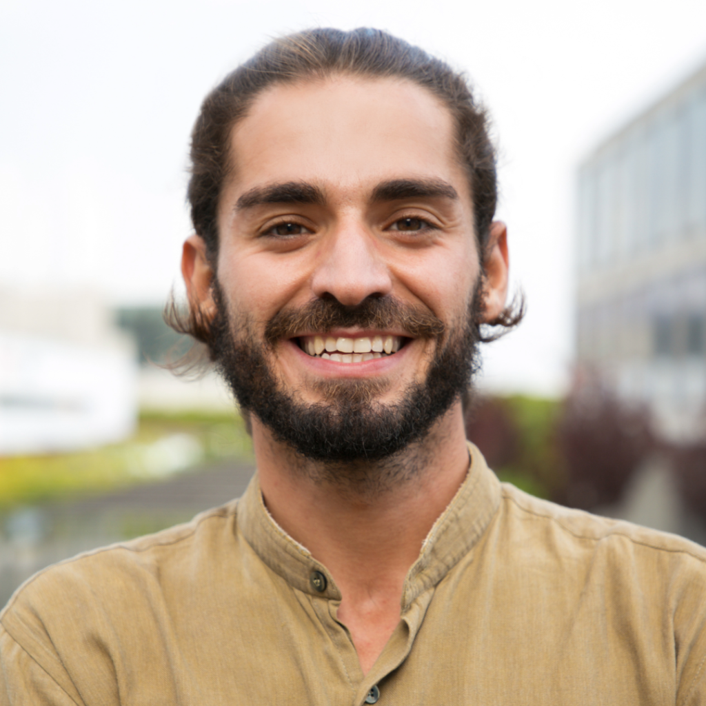 Smiling man with a yellow shirt