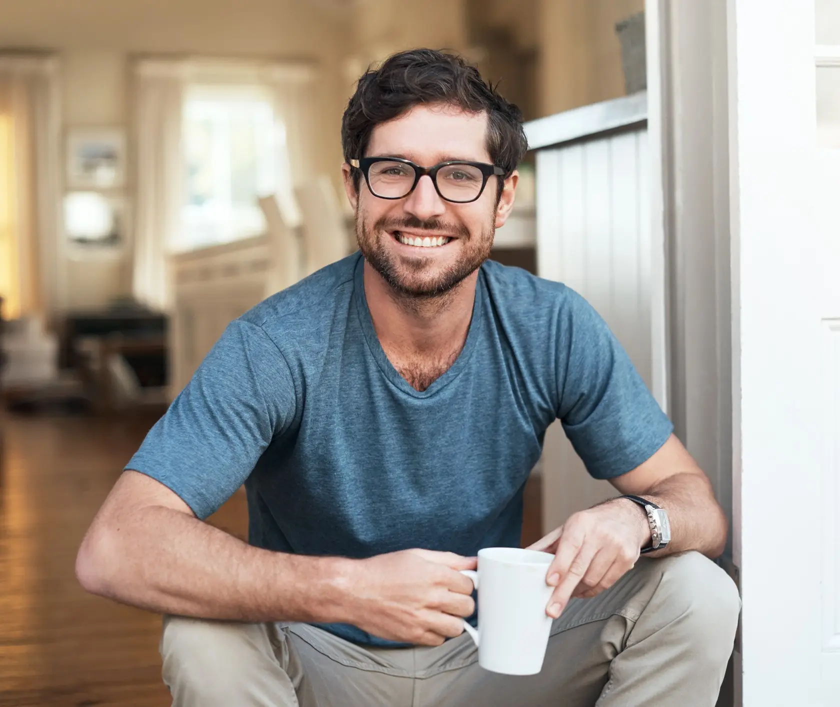 Cropped portrait of a handsome young man enjoying a cup of coffee in the morning