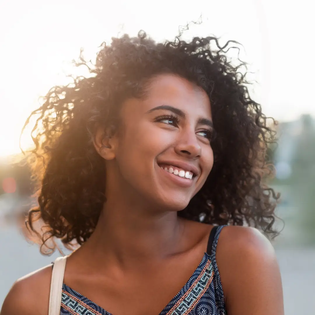 Smiling Woman with curly hair